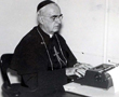 1950's - Bishop Bonhomme at typewriter